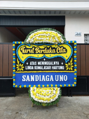 Papan Bunga Duka di Pulau Kelapa